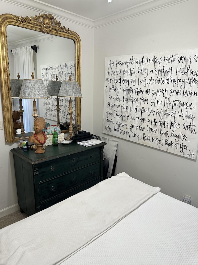 bedroom with ornamental molding