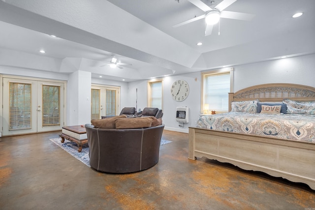 bedroom with access to exterior, french doors, heating unit, a tray ceiling, and ceiling fan