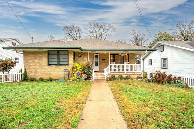 view of front of house with a front lawn and a porch