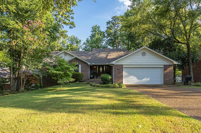 view of front of home featuring a garage and a front lawn