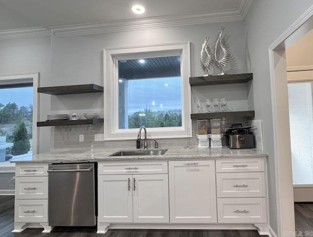 kitchen featuring dark hardwood / wood-style flooring, light stone counters, sink, dishwasher, and white cabinets