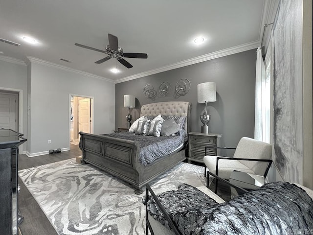 bedroom with ceiling fan, ensuite bathroom, dark hardwood / wood-style floors, and ornamental molding