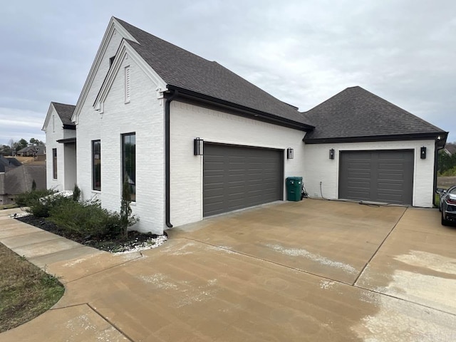 view of home's exterior with a garage