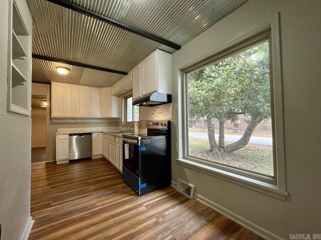 kitchen with dark wood finished floors, range with electric stovetop, a sink, dishwasher, and under cabinet range hood