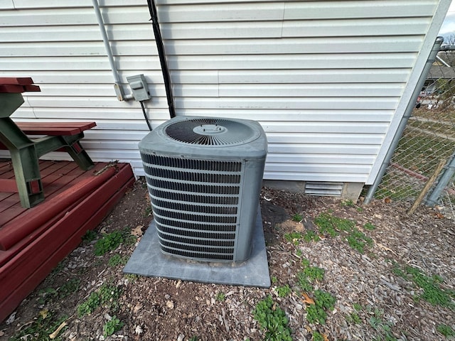 exterior details featuring cooling unit