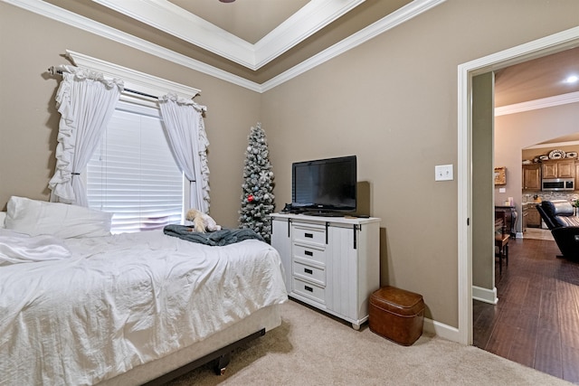 bedroom featuring light hardwood / wood-style floors and ornamental molding