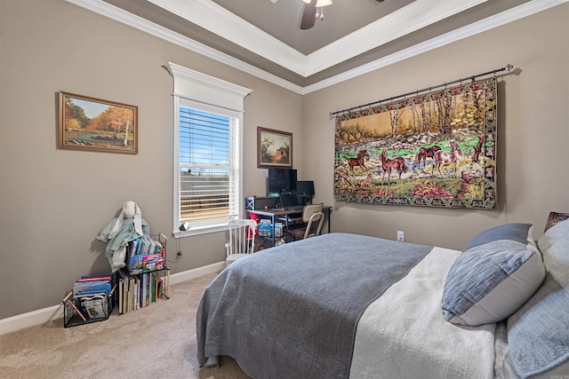 carpeted bedroom featuring ceiling fan and ornamental molding