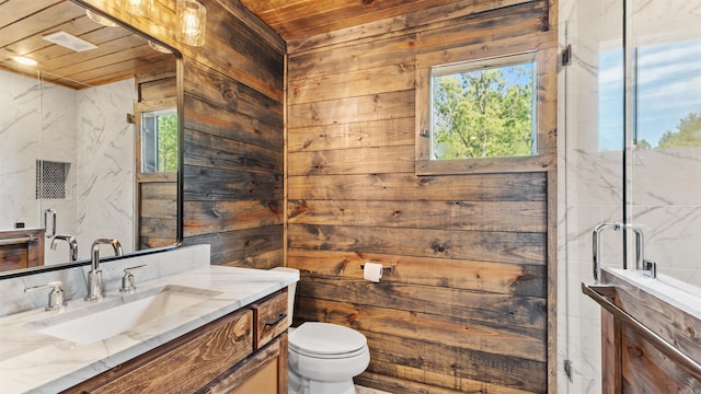 bathroom featuring vanity, toilet, wooden ceiling, and wood walls