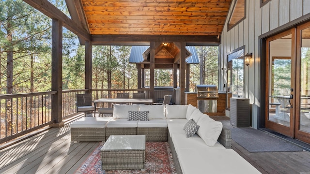 unfurnished sunroom featuring wooden ceiling and vaulted ceiling