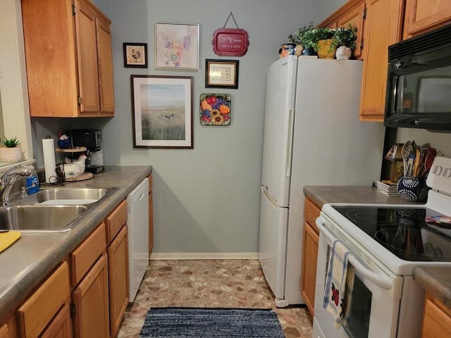 kitchen with white appliances and sink