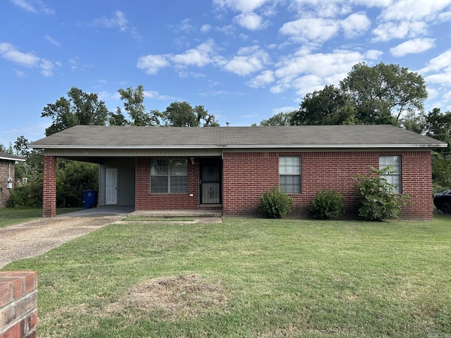 4705 Goodwin Cir, North Little Rock, AR 72117 - ranch-style house with a front lawn and a carport