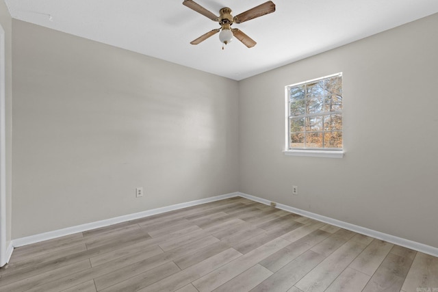 unfurnished room with ceiling fan and light hardwood / wood-style floors