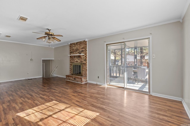 unfurnished living room with ceiling fan, wood-type flooring, a fireplace, and ornamental molding