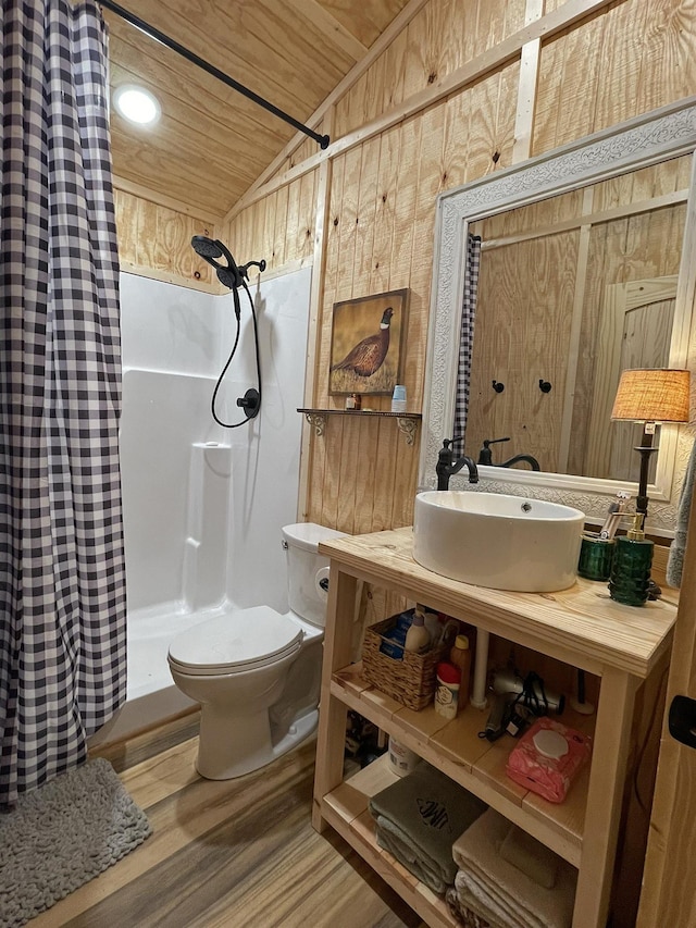 bathroom with sink, hardwood / wood-style floors, vaulted ceiling, toilet, and wood ceiling