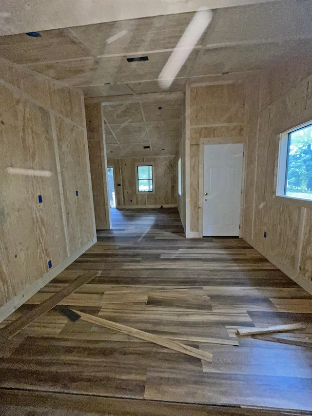 spare room with dark wood-type flooring