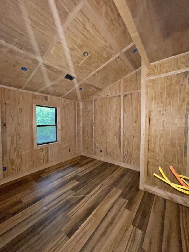 interior space featuring wooden ceiling and dark wood-type flooring