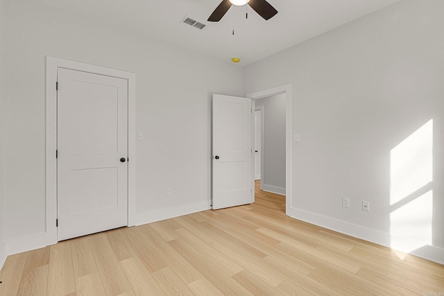 unfurnished bedroom with light hardwood / wood-style flooring and ceiling fan