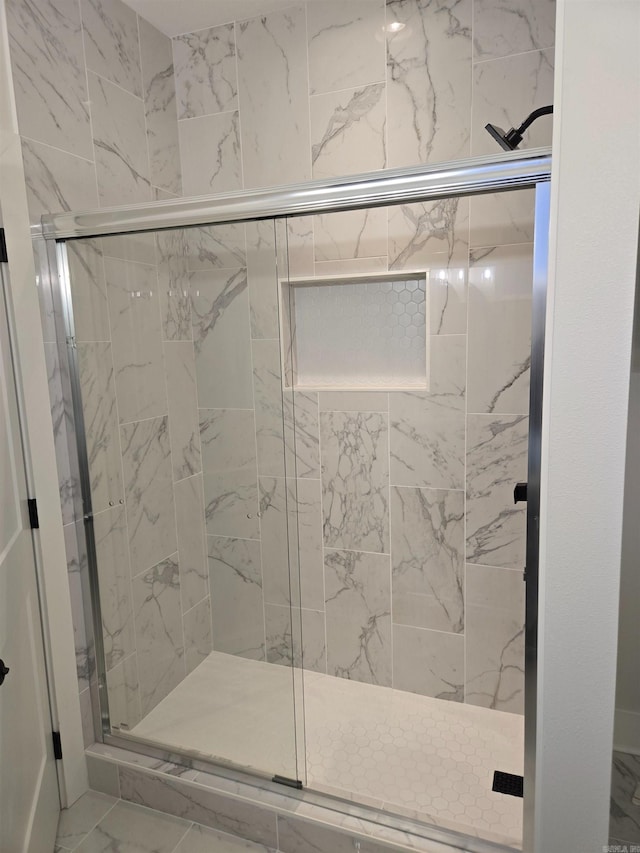 bathroom featuring walk in shower