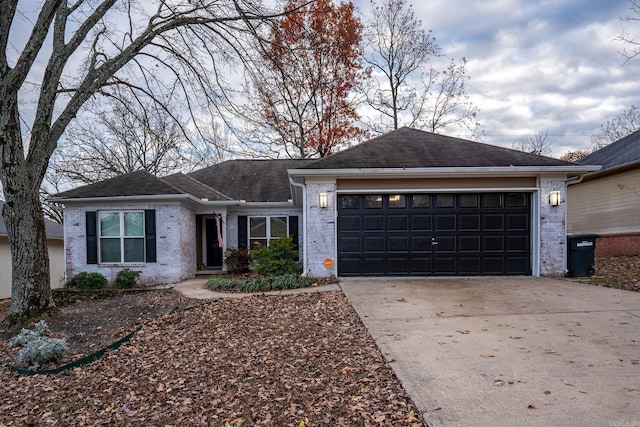 single story home with a garage