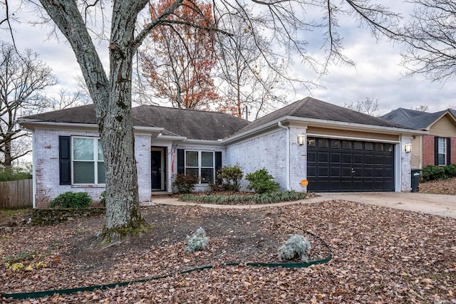 single story home with a garage