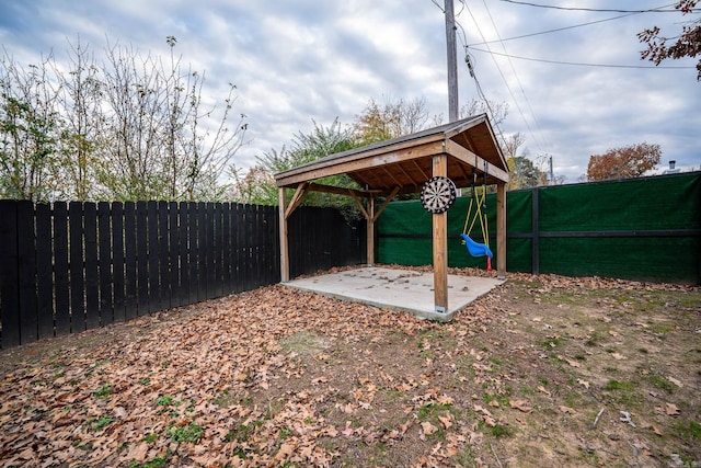 view of yard featuring a gazebo and a patio area