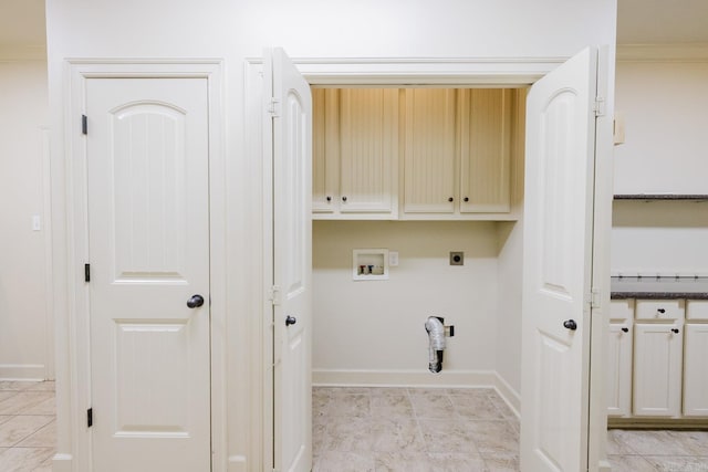 laundry area with cabinets, washer hookup, ornamental molding, and hookup for an electric dryer