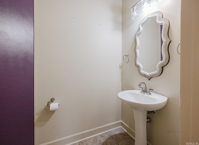 bathroom featuring tile patterned floors and sink