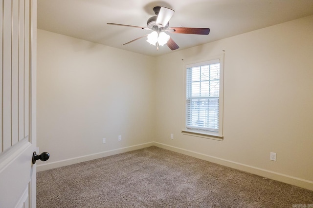 unfurnished room with carpet flooring and ceiling fan