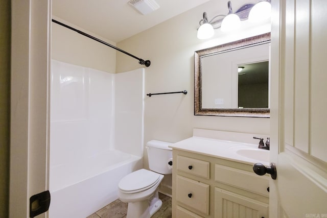 full bathroom featuring tile patterned floors, vanity, toilet, and tub / shower combination