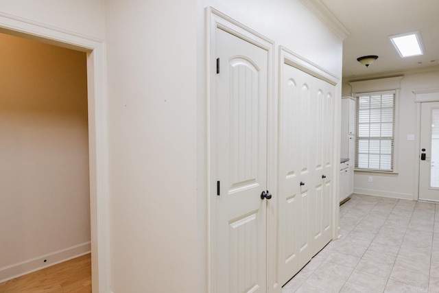 hallway with crown molding