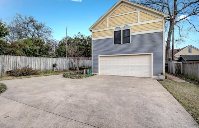 view of property exterior featuring a garage