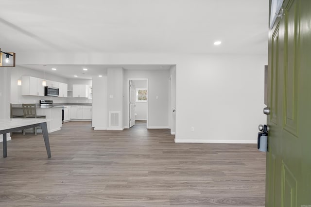 living room featuring light wood-type flooring