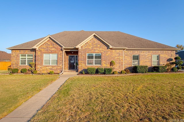 view of front facade with a front lawn