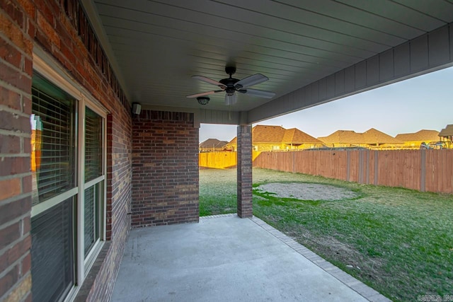 view of patio / terrace featuring ceiling fan