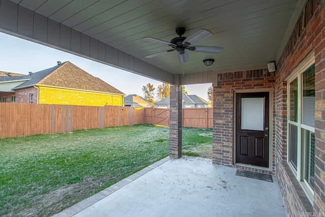 exterior space featuring ceiling fan