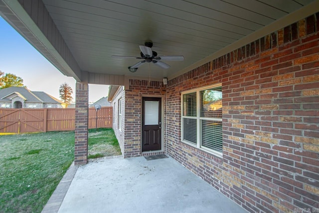 view of patio featuring ceiling fan