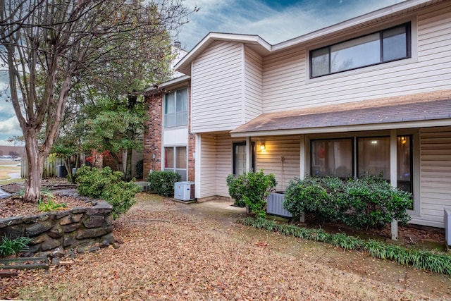 view of front of house featuring central AC