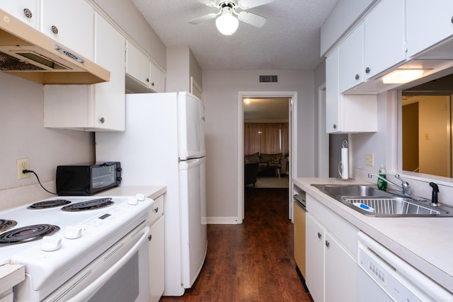 kitchen with white cabinetry, sink, dark wood-type flooring, and white appliances