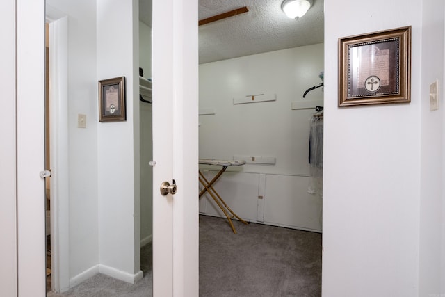 bathroom featuring a textured ceiling