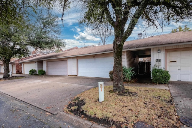 single story home featuring a garage