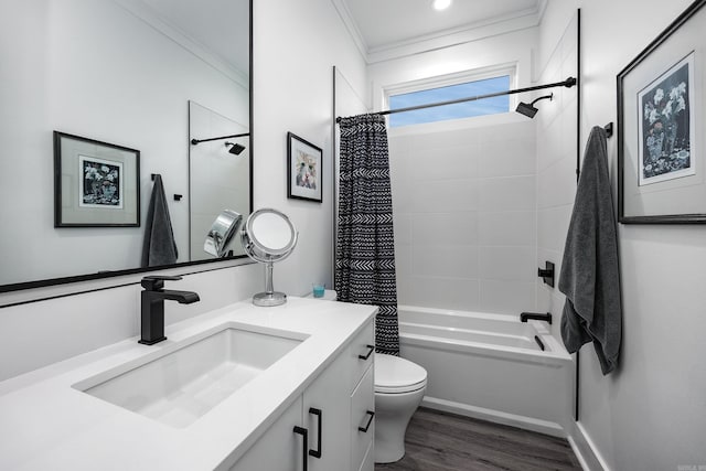 full bathroom with hardwood / wood-style floors, vanity, shower / bath combination with curtain, and ornamental molding