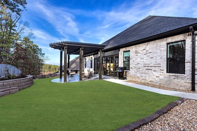 view of yard featuring a pergola and a patio