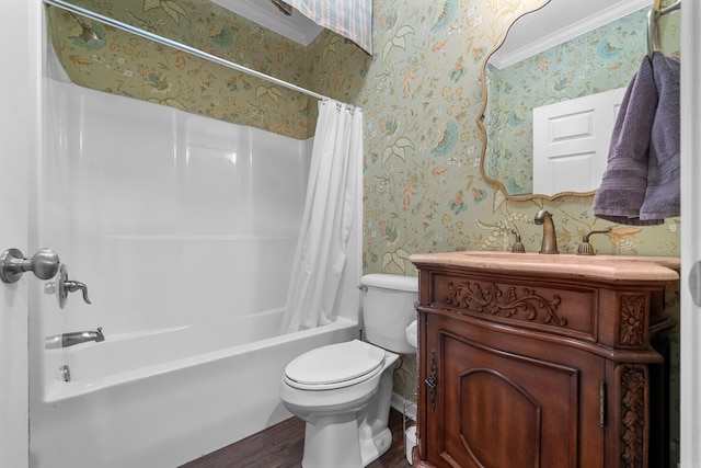 full bathroom with shower / bath combo, toilet, hardwood / wood-style flooring, vanity, and ornamental molding