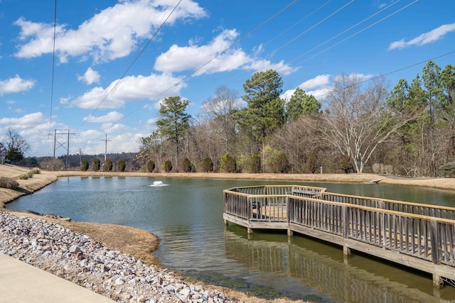 dock area featuring a deck with water view