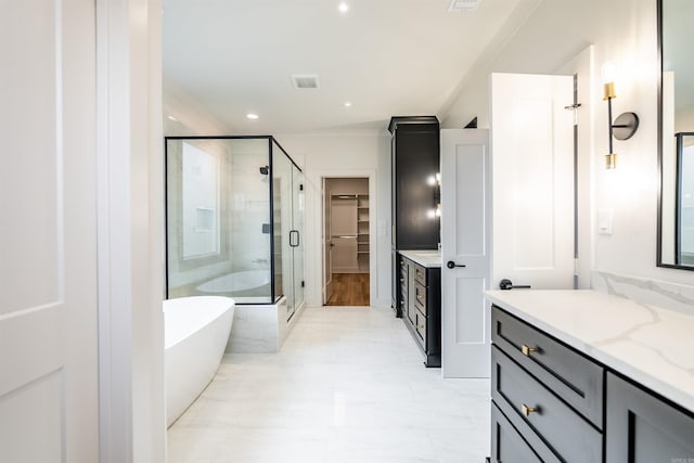 110 Eagle Ridge Dr, Maumelle, AR 72113 - bathroom featuring vanity, ornamental molding, and independent shower and bath