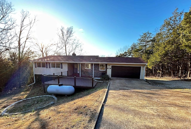 ranch-style home with a garage