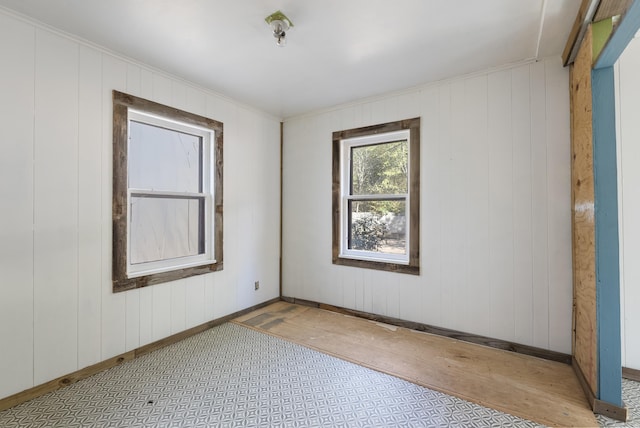 empty room with wooden walls