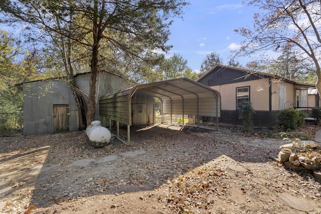 exterior space featuring a carport