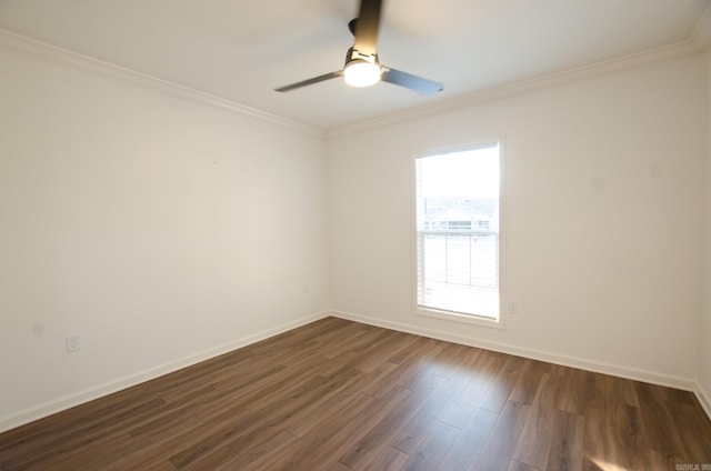 empty room with ornamental molding, ceiling fan, and dark hardwood / wood-style floors