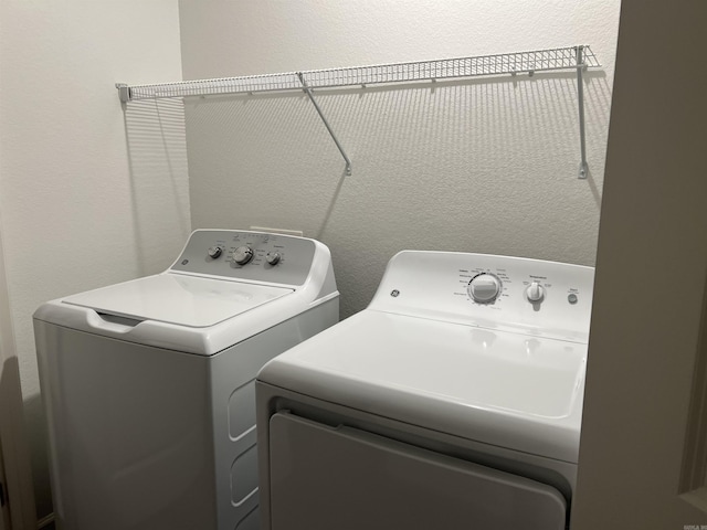 laundry room featuring independent washer and dryer